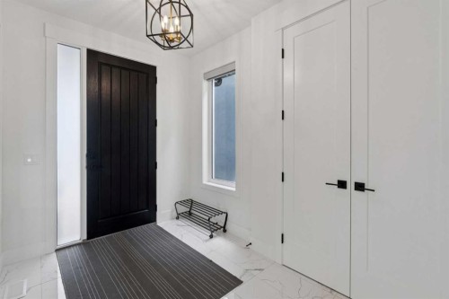 143 Aspen Summit Boulevard Sw, Calgary, AB - Indoor Photo Showing Other Room