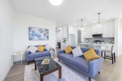 108 Heritage Manor, Cochrane, AB - Indoor Photo Showing Living Room