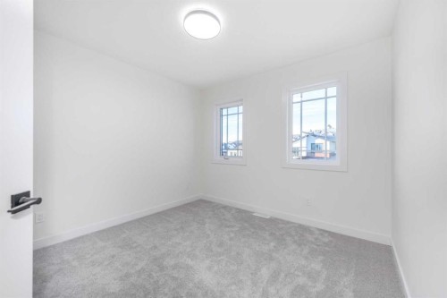 108 Heritage Manor, Cochrane, AB - Indoor Photo Showing Other Room