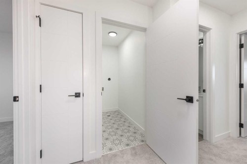 108 Heritage Manor, Cochrane, AB - Indoor Photo Showing Other Room