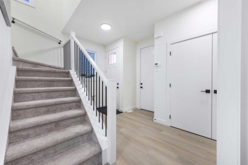 108 Heritage Manor, Cochrane, AB - Indoor Photo Showing Other Room