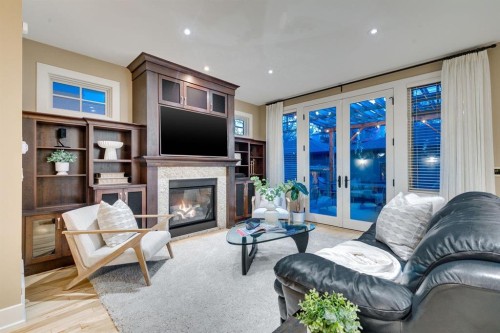 1727 Bowness Road Nw, Calgary, AB - Indoor Photo Showing Living Room With Fireplace