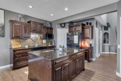 45 Hanson Hollow Ne, Langdon, AB - Indoor Photo Showing Kitchen With Double Sink With Upgraded Kitchen