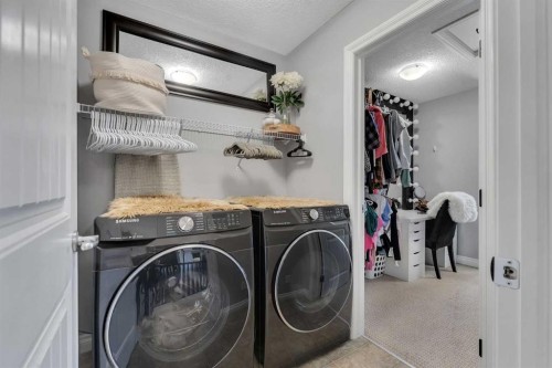 45 Hanson Hollow Ne, Langdon, AB - Indoor Photo Showing Laundry Room