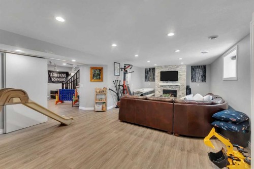 45 Hanson Hollow Ne, Langdon, AB - Indoor With Fireplace