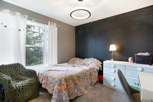 204 Eversyde Circle Sw, Calgary, AB - Indoor Photo Showing Bedroom