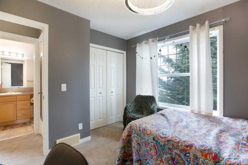 204 Eversyde Circle Sw, Calgary, AB - Indoor Photo Showing Bedroom