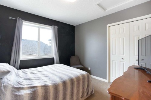 204 Eversyde Circle Sw, Calgary, AB - Indoor Photo Showing Bedroom