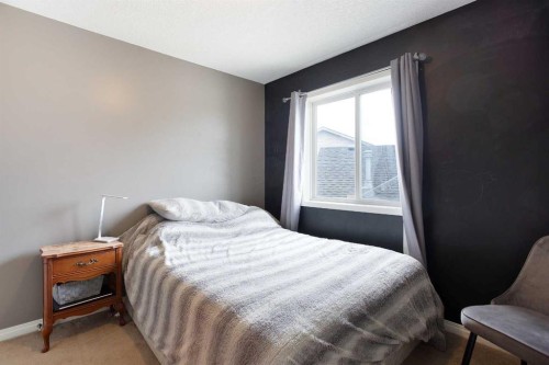 204 Eversyde Circle Sw, Calgary, AB - Indoor Photo Showing Bedroom