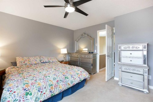 204 Eversyde Circle Sw, Calgary, AB - Indoor Photo Showing Bedroom
