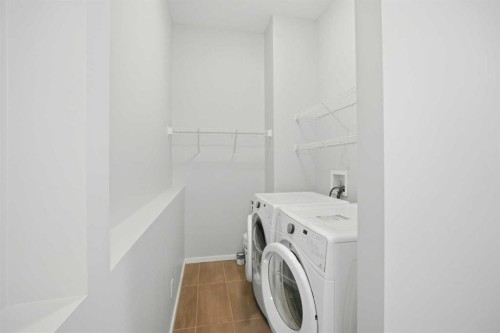 76 Nolancrest Green Nw, Calgary, AB - Indoor Photo Showing Laundry Room