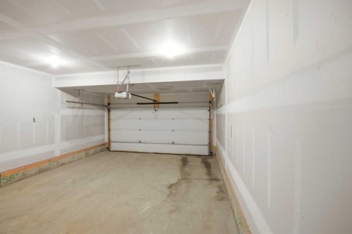 76 Nolancrest Green Nw, Calgary, AB - Indoor Photo Showing Garage