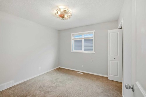 76 Nolancrest Green Nw, Calgary, AB - Indoor Photo Showing Other Room