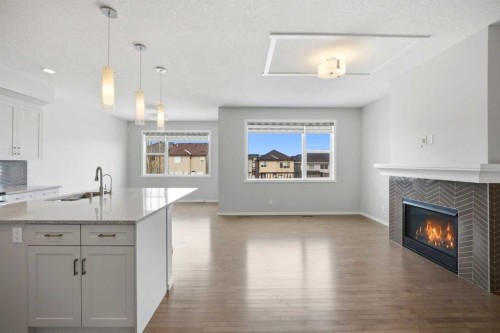 76 Nolancrest Green Nw, Calgary, AB - Indoor With Fireplace
