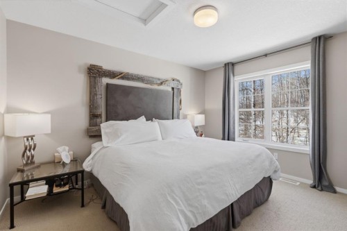 412 Ascot Circle Sw, Calgary, AB - Indoor Photo Showing Bedroom