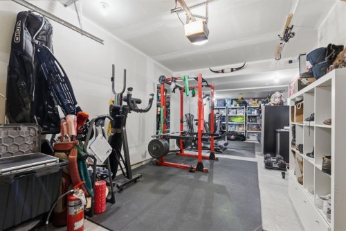 412 Ascot Circle Sw, Calgary, AB - Indoor Photo Showing Gym Room