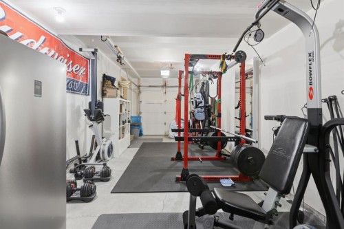 412 Ascot Circle Sw, Calgary, AB - Indoor Photo Showing Gym Room