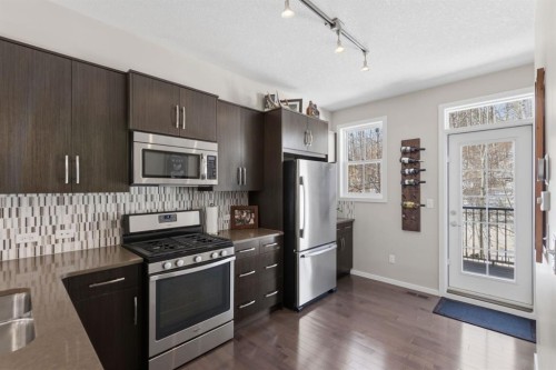 412 Ascot Circle Sw, Calgary, AB - Indoor Photo Showing Kitchen With Stainless Steel Kitchen With Double Sink