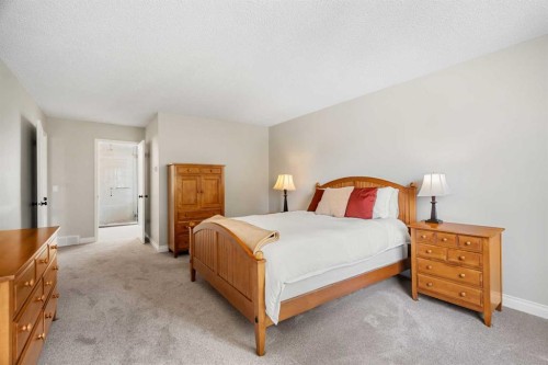 14 Sun Harbour Way Se, Calgary, AB - Indoor Photo Showing Bedroom