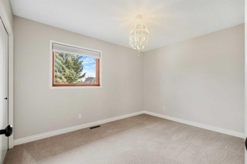 14 Sun Harbour Way Se, Calgary, AB - Indoor Photo Showing Other Room