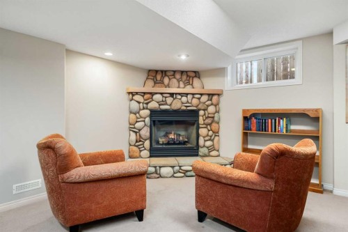 14 Sun Harbour Way Se, Calgary, AB - Indoor Photo Showing Other Room With Fireplace