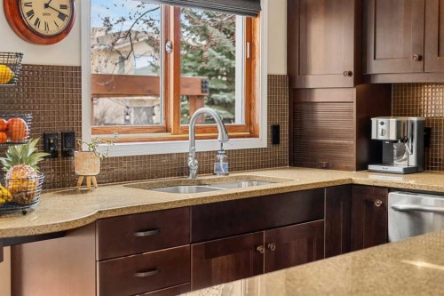 14 Sun Harbour Way Se, Calgary, AB - Indoor Photo Showing Kitchen With Double Sink
