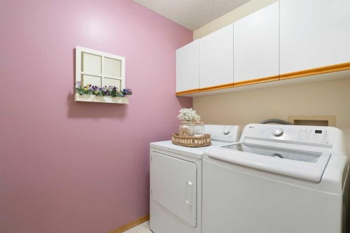 221 Scurfield Place Nw, Calgary, AB - Indoor Photo Showing Laundry Room