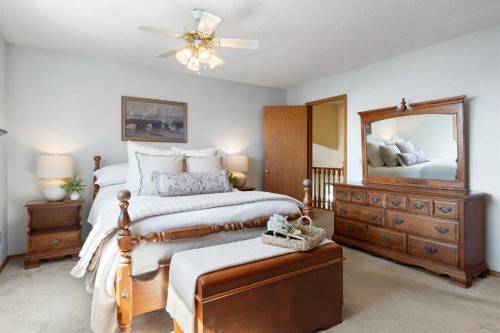 221 Scurfield Place Nw, Calgary, AB - Indoor Photo Showing Bedroom