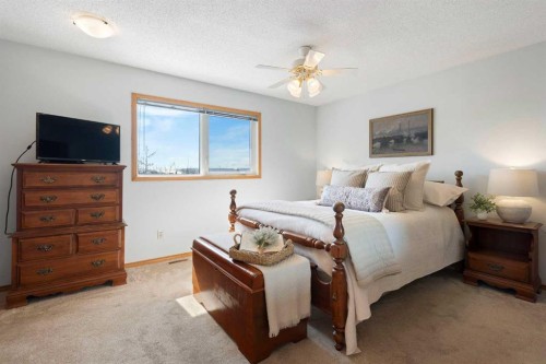 221 Scurfield Place Nw, Calgary, AB - Indoor Photo Showing Bedroom