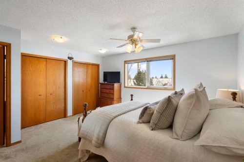 221 Scurfield Place Nw, Calgary, AB - Indoor Photo Showing Bedroom