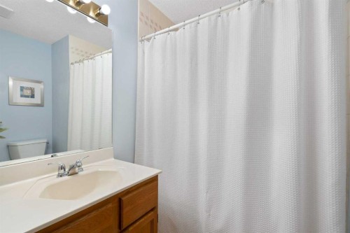 221 Scurfield Place Nw, Calgary, AB - Indoor Photo Showing Bathroom