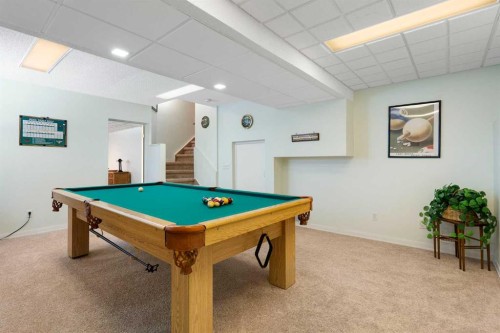 221 Scurfield Place Nw, Calgary, AB - Indoor Photo Showing Other Room