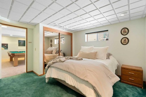 221 Scurfield Place Nw, Calgary, AB - Indoor Photo Showing Bedroom
