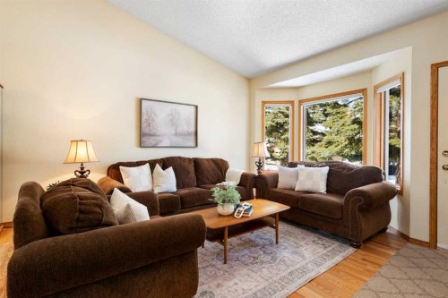 221 Scurfield Place Nw, Calgary, AB - Indoor Photo Showing Living Room