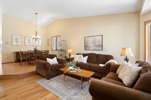 221 Scurfield Place Nw, Calgary, AB - Indoor Photo Showing Living Room