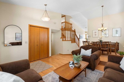 221 Scurfield Place Nw, Calgary, AB - Indoor Photo Showing Living Room