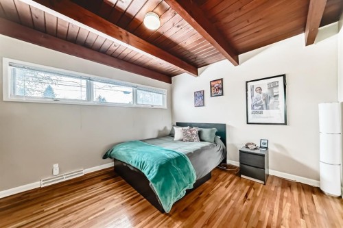19 Meadowview Road Sw, Calgary, AB - Indoor Photo Showing Bedroom