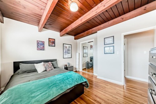 19 Meadowview Road Sw, Calgary, AB - Indoor Photo Showing Bedroom