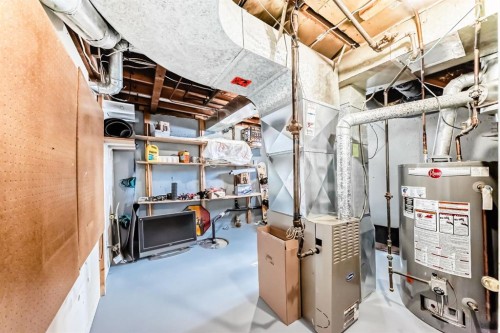 19 Meadowview Road Sw, Calgary, AB - Indoor Photo Showing Basement
