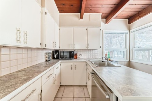19 Meadowview Road Sw, Calgary, AB - Indoor Photo Showing Kitchen