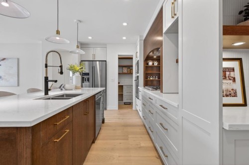 10619 Mapleglen Crescent Se, Calgary, AB - Indoor Photo Showing Kitchen With Double Sink With Upgraded Kitchen