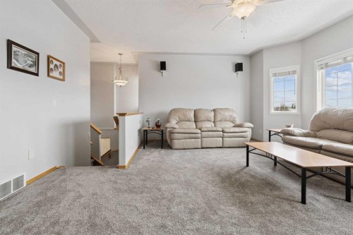 115 Cove Crescent, Chestermere, AB - Indoor Photo Showing Living Room