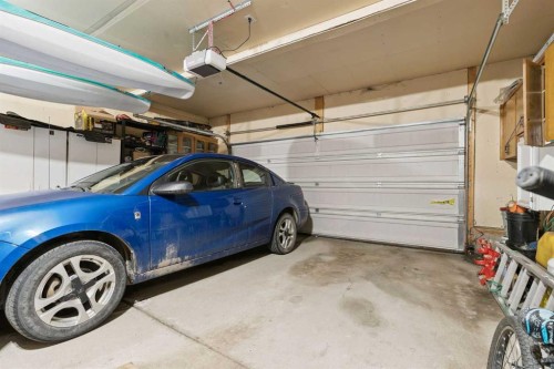 115 Cove Crescent, Chestermere, AB - Indoor Photo Showing Garage