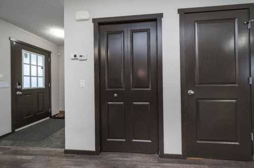 702 Panamount Boulevard Nw, Calgary, AB - Indoor Photo Showing Other Room