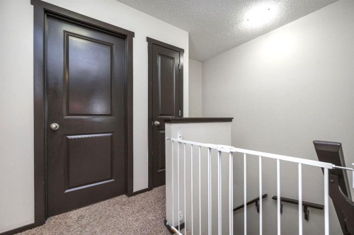 702 Panamount Boulevard Nw, Calgary, AB - Indoor Photo Showing Other Room