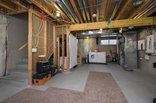 702 Panamount Boulevard Nw, Calgary, AB - Indoor Photo Showing Basement