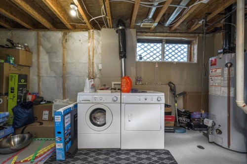 702 Panamount Boulevard Nw, Calgary, AB - Indoor Photo Showing Laundry Room
