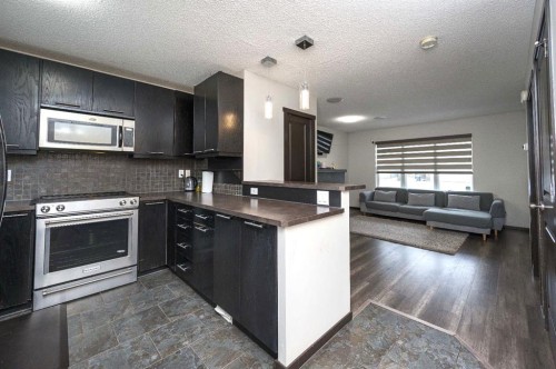 702 Panamount Boulevard Nw, Calgary, AB - Indoor Photo Showing Kitchen