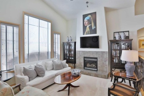 92 Sherwood Rise Nw, Calgary, AB - Indoor Photo Showing Living Room With Fireplace