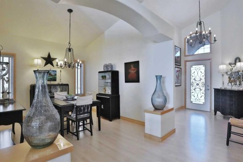 92 Sherwood Rise Nw, Calgary, AB - Indoor Photo Showing Dining Room With Fireplace